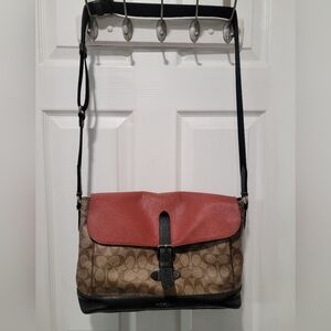 Stylish Coach Brown,tan, and Reddish bag.